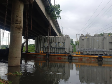 Waterway transportation using barge.
