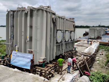 Temporarry jetty preparation to unload heavy cargo from barge.